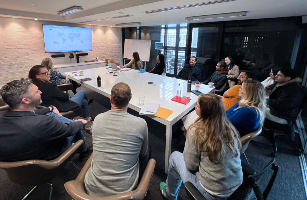 people from Frontier Australia in a conference room talking